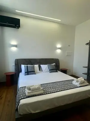 Letto o letti in una camera di Luxenti Luxury Rooms