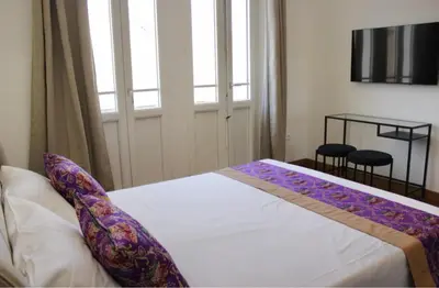 Letto o letti in una camera di Luxenti Luxury Rooms
