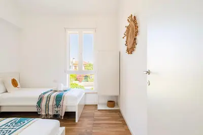 Letto o letti in una camera di Sardinian Pearl - Poetto Beach Villa, South Sardinia