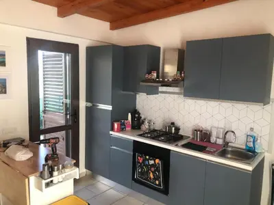 Cucina o angolo cottura di Esclusiva privata casa famiglia