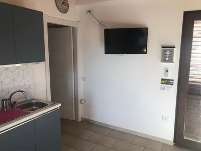 Cucina o angolo cottura di Esclusiva privata casa famiglia