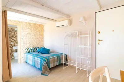 Letto o letti in una camera di 5' from the Sea, Modern Apartment with Terrace, BBQ and Sea View