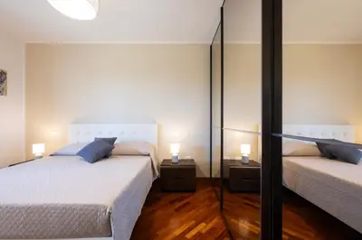 Letto o letti in una camera di 5' from the Sea, Modern Apartment with Terrace, BBQ and Sea View