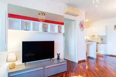 Cucina o angolo cottura di 5' from the Sea, Modern Apartment with Terrace, BBQ and Sea View