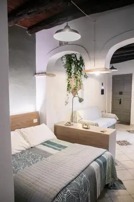 Letto o letti in una camera di La casa di Hestia