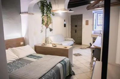 Letto o letti in una camera di La casa di Hestia