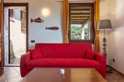 Area soggiorno di GuestHost - Bedà House