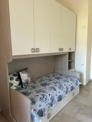 Letto o letti in una camera di Casa Camilla