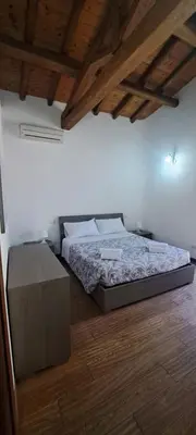 Letto o letti in una camera di Casa Esterina