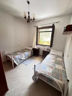 Letto o letti in una camera di Guest House Zia Maria