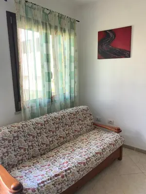 Area soggiorno di Guest House Zia Maria