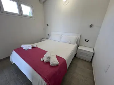 Letto o letti in una camera di Almà