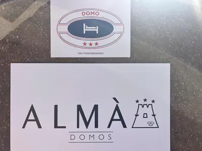 Certificato, attestato, insegna o altro documento esposto da Almà