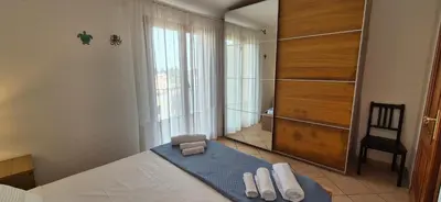 Letto o letti in una camera di Lichia Apartment