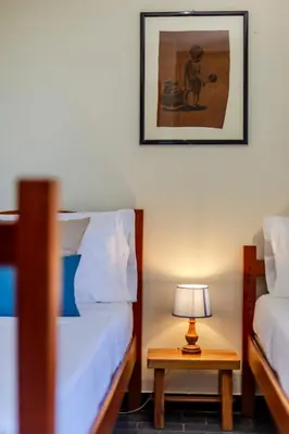 Letto o letti in una camera di Villa Etnic Eloise a walk from Porto Pino beach