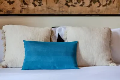 Letto o letti in una camera di Villa Etnic Eloise a walk from Porto Pino beach