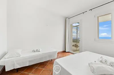 Letto o letti in una camera di Sa Stadda