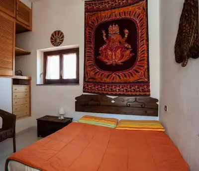 Letto o letti in una camera di Casa Ottavia