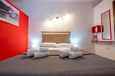 Letto o letti in una camera di Yenne Home