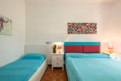 Letto o letti in una camera di Villa Alba