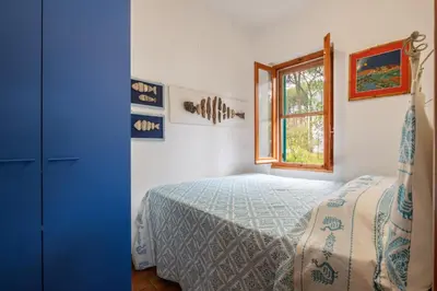 Letto o letti in una camera di Villa Alba