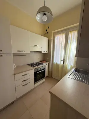 Cucina o angolo cottura di 50m from a stunning, exclusive coastal beach - 4 bedrooms house