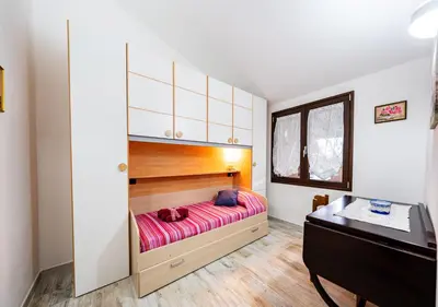 Letto o letti in una camera di Villa ROSA Tertenia