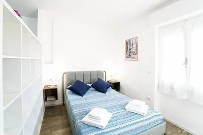 Letto o letti in una camera di Casa Sollai