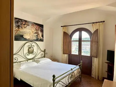 Letto o letti in una camera di Sa Cralla Villasimius with sea view