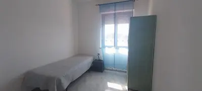 Letto o letti in una camera di Casa Kimbe
