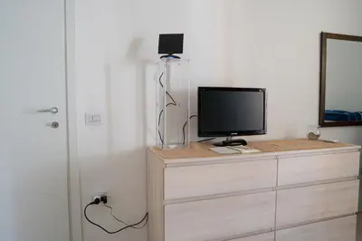 TV o dispositivi per l'intrattenimento presso Casa in centro Iglesias il tetto dei nonni Onorat0