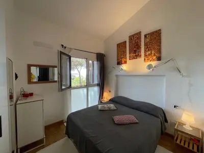 Letto o letti in una camera di Alisei Home Holidays 4