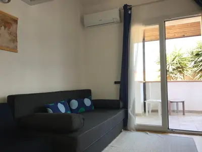 Area soggiorno di Alisei Home Holidays 4