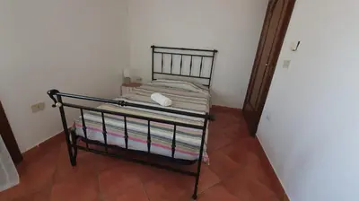 Letto o letti in una camera di Il porto