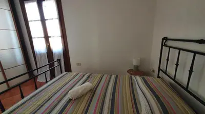 Letto o letti in una camera di Il porto