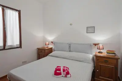 Letto o letti in una camera di Villetta con terrazza a 400 mt dal mare