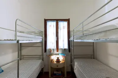 Letto o letti in una camera di Villetta con terrazza a 400 mt dal mare