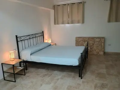 Letto o letti in una camera di Casa Vacanza Fuori le Mura