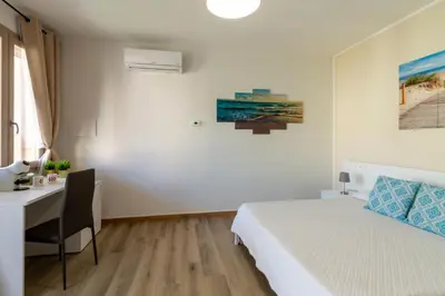 Letto o letti in una camera di Affittacamere Lumal