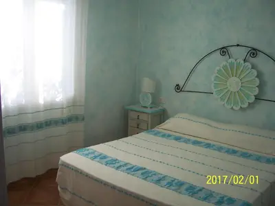 Letto o letti in una camera di Le pavoncelle