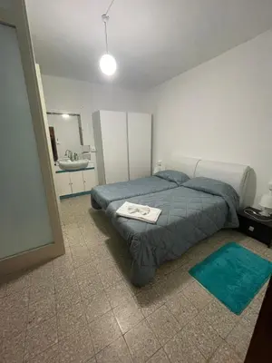 Letto o letti in una camera di Casa Meri