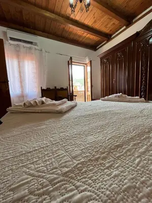 Letto o letti in una camera di Casa Meri