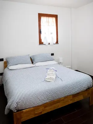 Letto o letti in una camera di Ida mare blu vacanze