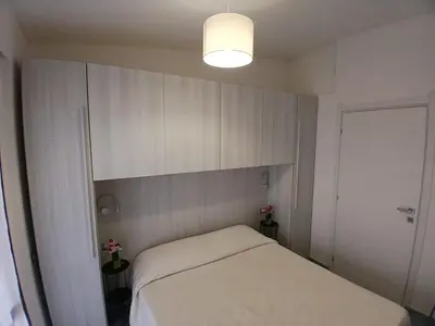 Letto o letti in una camera di Casa Orchidea