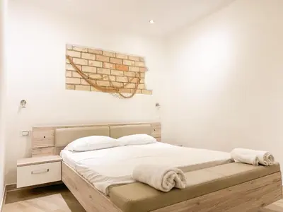 Letto o letti in una camera di Kalma - Lamarmora at the heart of old town