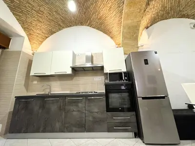 Cucina o angolo cottura di Kalma Brick Arch Apartment - Central & Authentic