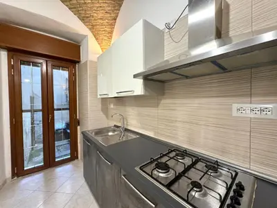 Cucina o angolo cottura di Kalma Brick Arch Apartment - Central & Authentic
