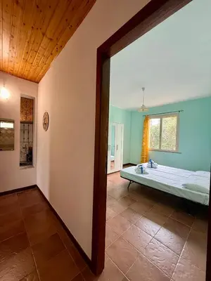 Letto o letti in una camera di Casa Fiorita