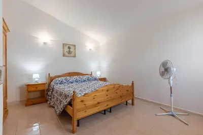 Letto o letti in una camera di GuestHost - Cri's Home