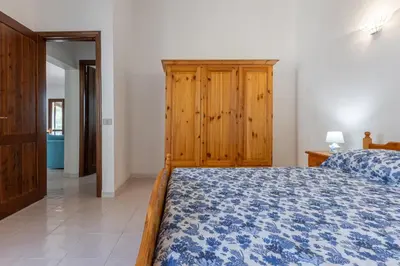 Letto o letti in una camera di GuestHost - Cri's Home